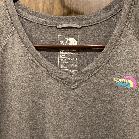 North face gray V-neck T-shirt. Size large, but fits like a medium. - Picture 2 of 2